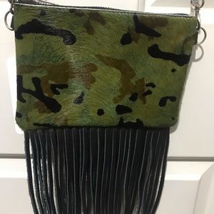 Leather crossbody bag with camo print